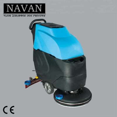 Battery powered walk behind rotating brush floor scrubber